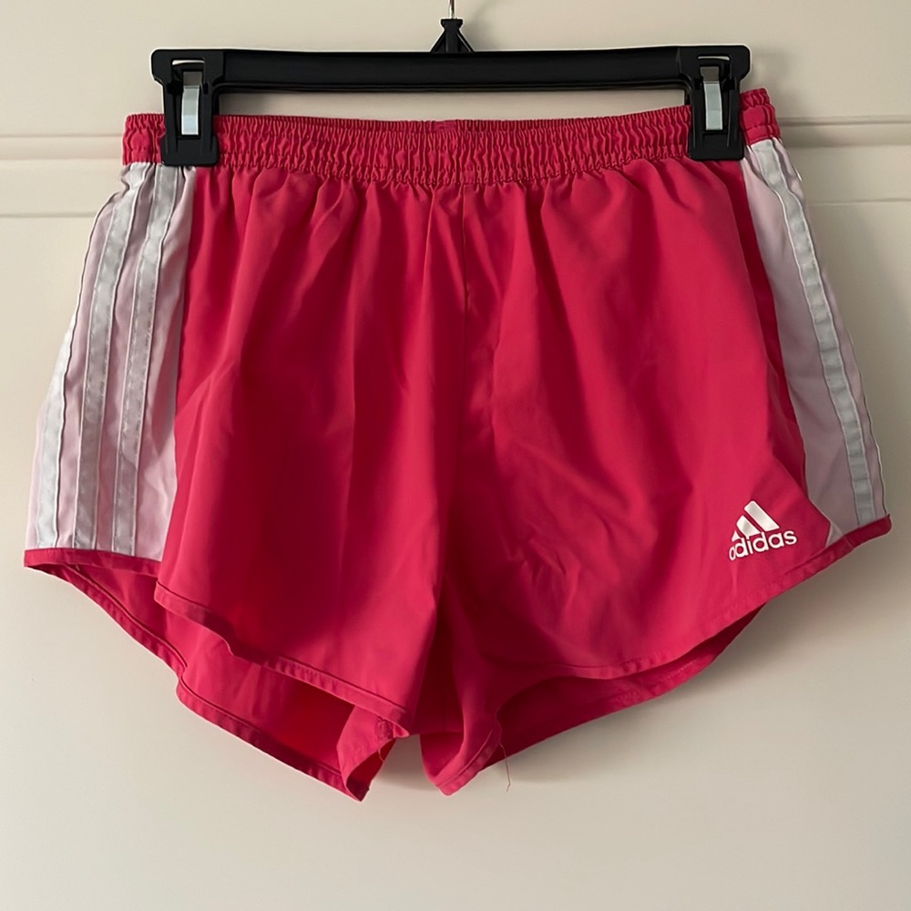 Adidas pink running shorts.